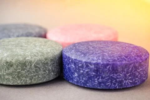 Colorful round solid shampoo bars, zero waste Stock Photos