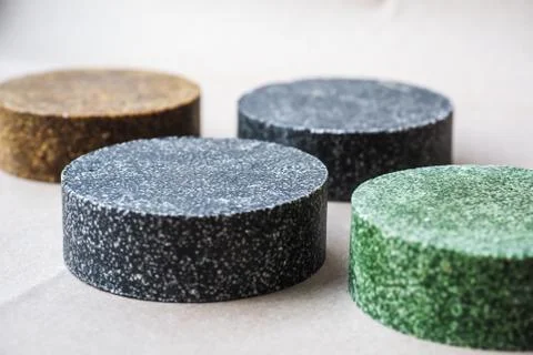 Colorful round solid shampoo bars, zero waste Stock Photos