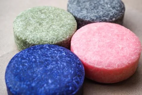 Colorful round solid shampoo bars, zero waste Stock Photos