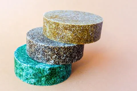 Colorful round solid shampoo bars, zero waste Stock Photos