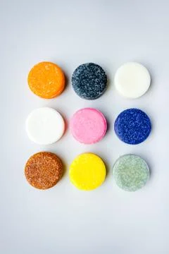 Colorful round solid shampoo bars, zero waste Stock Photos