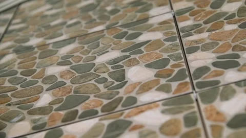 Colorful samples of ceramic tiles are displayed on the store shelf. Stock Footage 205062723