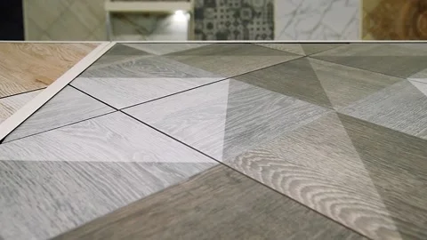 Colorful samples of ceramic tiles are displayed on the store shelf. Stock Footage 205062732