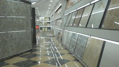Colorful samples of a stone tile in store. Marble and granite flooring Stock Footage 97508928