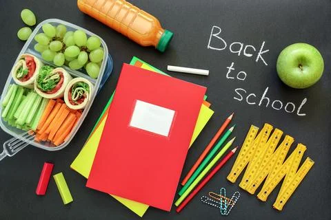 Colorful school lunch setup featuring healthy snacks, vibrant fruits, and Stock Photos