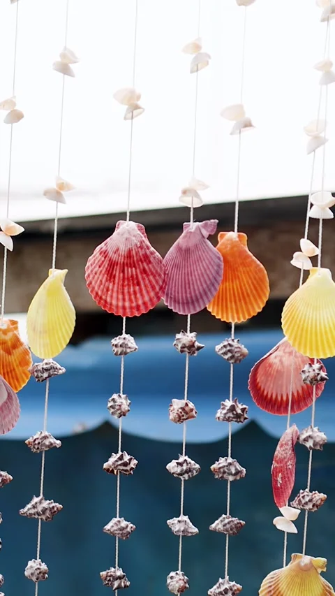 Colorful Seashell Wind Chimes Hanging at a Tropical Souvenir Market Stock Footage 340183251