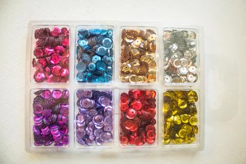 Colorful sequins. material for creativity and needlework. Stock Photos