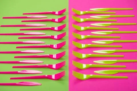 Colorful set of plastic table ware isolated on background 写真素材