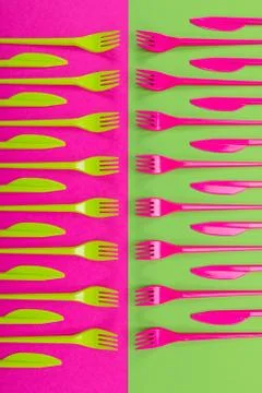 Colorful set of plastic table ware isolated on background Stock Photos