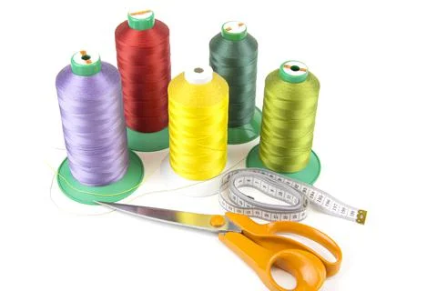 Colorful sewing thread, background, tailor-related images. On a white backgro Foto stock