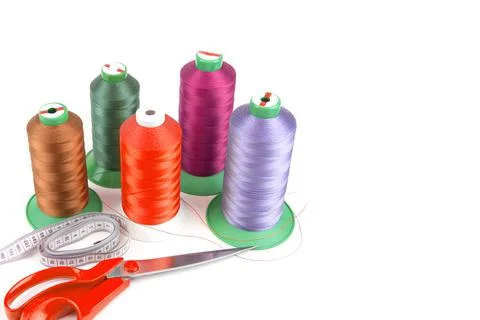 Colorful sewing thread, background, tailor-related images. On a white backgro Foto stock