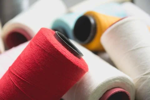 Colorful sewing threads, Colored thread coils. Stock Photos