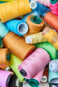 Colorful Sewing Threads in Creative Disarray, Top View Stock Photos