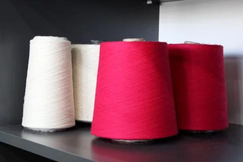 Colorful sewing threads wound on a thread spool. textile Stock Photos