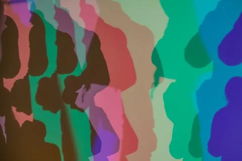 Colorful shadows cast on a wall through RGB lighting Stock Illustration