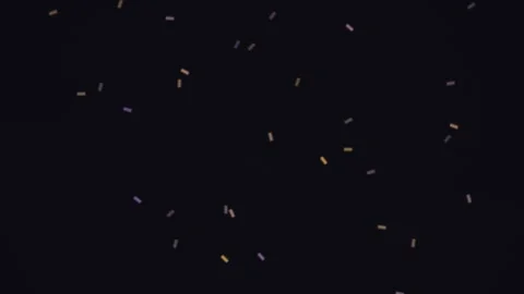 Colorful shapes float in dark space with gentle movement Stock Footage 338286345
