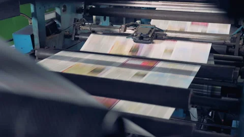 Colorful sheets on a conveyor, close up. Stock Footage 90839845