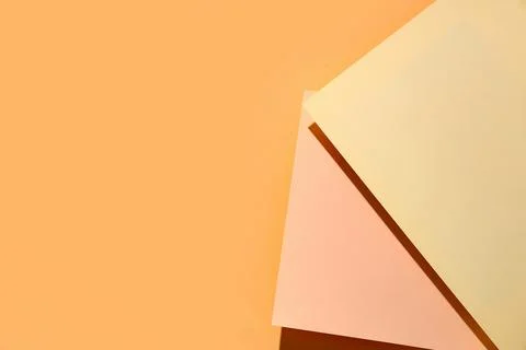 Colorful sheets of paper on beige background Stock Photos