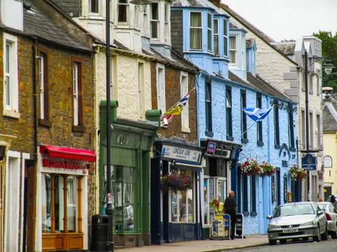 Colorful shops in St Cuthbert Street in Kirkcudbright Stock Photos