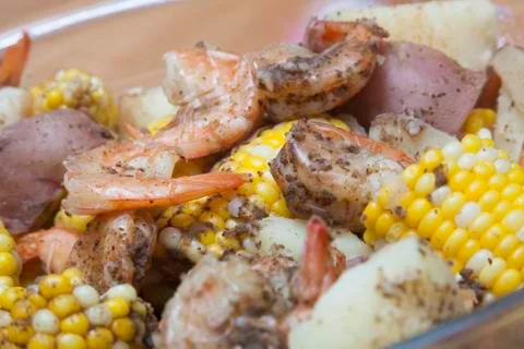 Colorful Shrimp, Corn, and Potatoes in a Bowl for a Shrimp Boil Feast Stock Photos