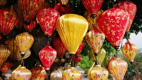 Colorful silk lanterns swaying in the wind during the lunar new year celebr.. Stock Footage 336980860