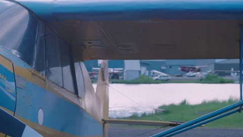 Colorful Single Engine Light Aircraft Airplane in Small Airfield Stock Footage 83123925