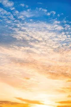 Colorful sky with clouds during sunset in the evening Stock Photos