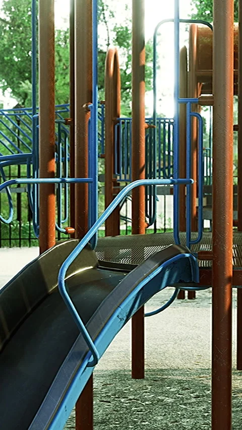 Colorful slides and climbing structures in afternoon playtime Stock Footage 317759156