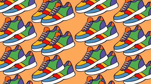 Colorful Sneakers Pattern on Peach Background Stock Footage 337671593