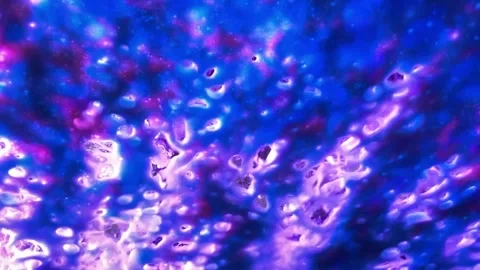 Colorful soap suds rinse off windshield inside car wash Stock Footage 248542881