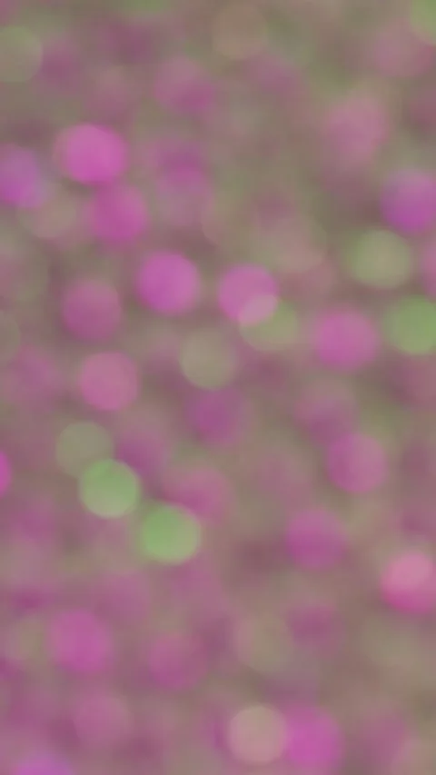 Colorful sparkles dance in the light creating a vibrant, shimmering effect Stock Footage 321378335