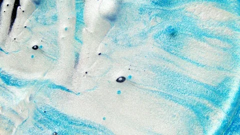 Colorful sparkling paints mix in beautiful patterns. Oil ink of blue. Stock Footage 99742653