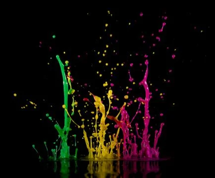 Colorful splashes of paint. Stock Photos