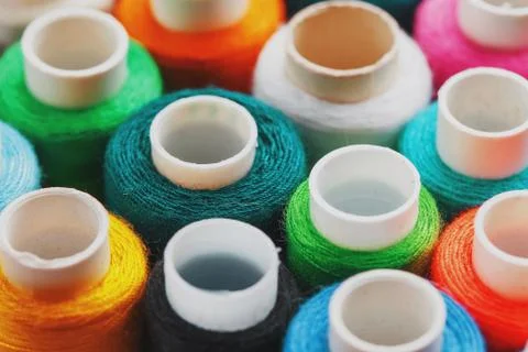 Colorful spools of sewing thread. Colored thread for sewing Stock Photos