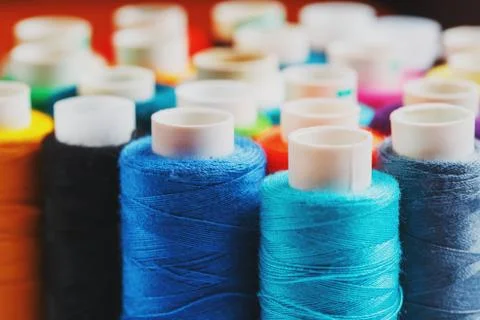 Colorful spools of sewing thread. Colored thread for sewing Stock Photos