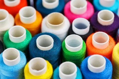 Colorful spools of sewing thread. Colored thread for sewing Stock Photos