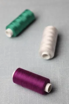 Colorful spools of sewing threads Stock Photos