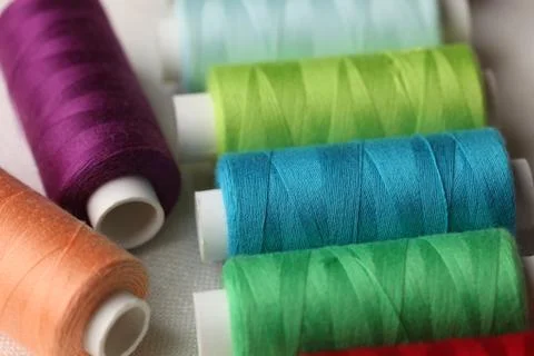 Colorful spools of sewing threads Stock Photos