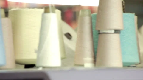 Colorful spools of thread at textile factory. Yarn reels. Cotton thread spools Stock Footage 23715466