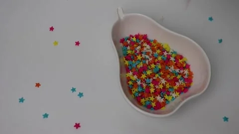 Colorful sprinkles Vídeo Stock 142475649