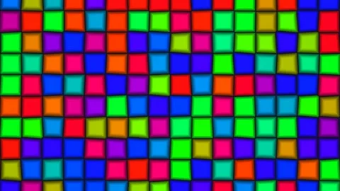 Colorful squares create a vibrant pattern on a flat surface Stock Footage 338288883