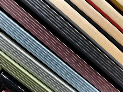 Colorful Stack of Fabric Samples Display Stock Photos