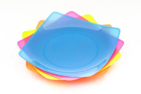 Colorful stack plastic dish on white background Stock Photos