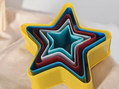 Colorful Stacked Star Shaped Objects for Creative Decoration Concept Stock Photos