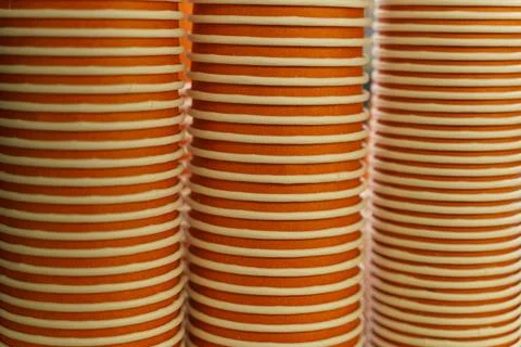 Colorful stacking cups ready for a lively gathering in a vibrant cafe Stock Photos