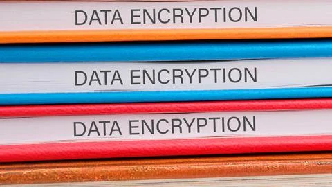Colorful stacks of books on data encryption highlight the significance of s.. Stock Photos