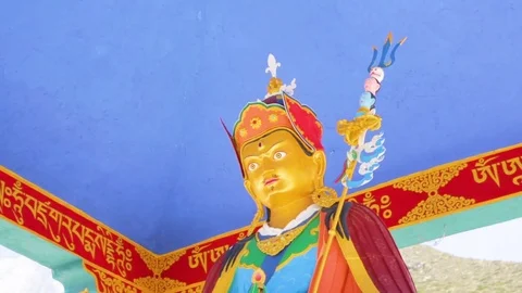 Colorful statue of Buddha in a temple Stock Footage 77449834