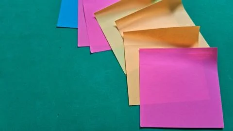Colorful sticky notes arranged in overlapping sequence. Vibrant paper tabs for Stock Photos