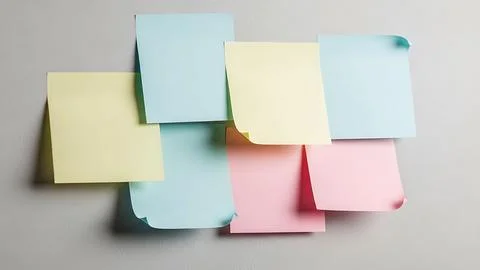 Colorful sticky notes on a light surface Stock Photos