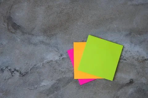 Colorful sticky notes on stone background Image Foto stock